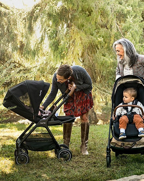 Nuna Trio Triv Riveted with Carrycoat and Pipa Next Car Seat Trio and Duo Strollers