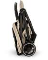 Nuna TRVL Compact Stroller - Biscuits - Chocolate - Ideal for Traveling and the City Lights Strollers